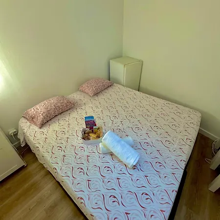 Em Quarto em Acomodações Particulares